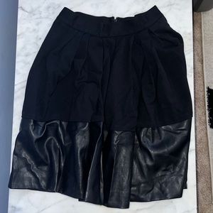 Pleated leather hem skirt